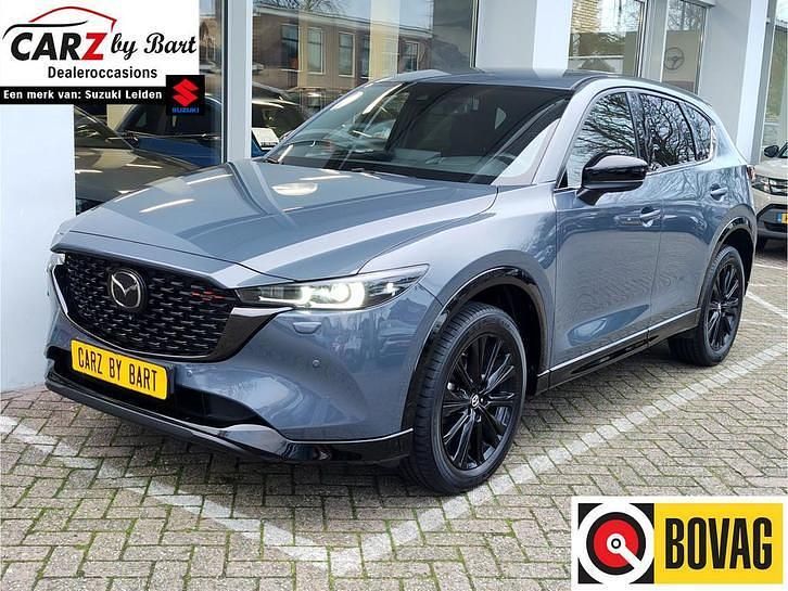 Blauw (metallic) Gebruikt 2024 Mazda CX-5 Homura-Line SUV | € 37.945 (Goede deal) - Afbeelding 1/4