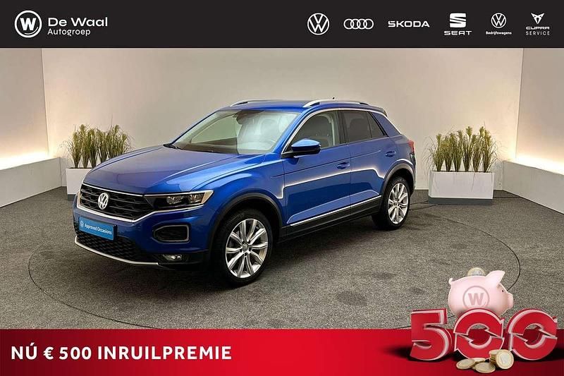 Ravenna blue metallic Gebruikt 2020 VW T-Roc Sportline SUV | € 23.900 (Eerlijke prijs) - Afbeelding 1/3