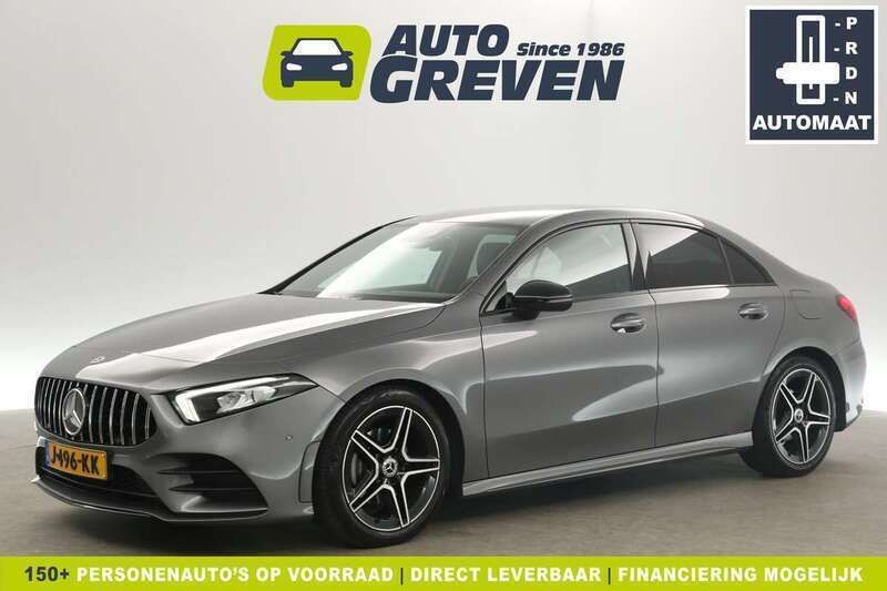 Grijs, metallic lak Gebruikt 2020 Mercedes A180 AMG Sedan | € 22.800 (Eerlijke prijs) - Afbeelding 1/4