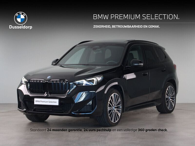Zwart Gebruikt 2023 BMW iX1 Executive SUV | € 43.995 - Afbeelding 1/4