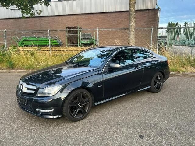 Occasion Mercedes C180 AMG 156 PK (114 kW) 2012 Zwart Coupé