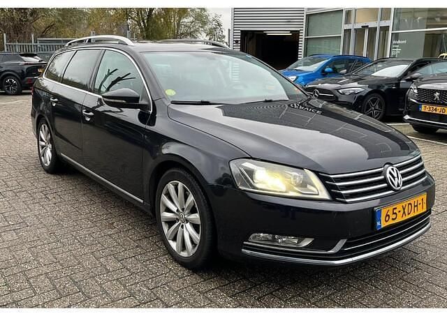 Zwart Gebruikt 2012 VW Passat Executive Stationwagen | € 4.499 (Duur) - Afbeelding 1/4