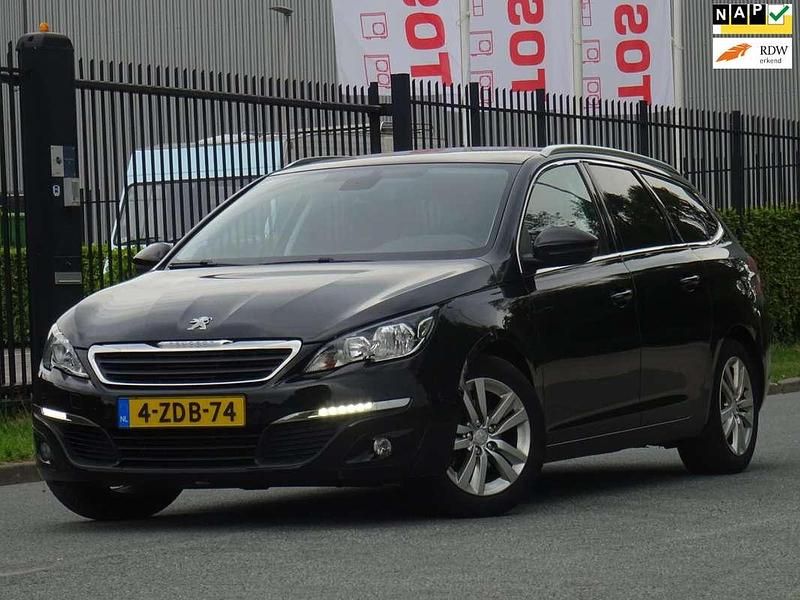 Zwart Occasion 2015 Peugeot 308 Stationwagen | € 3.999 (Duur) - Afbeelding 1/4