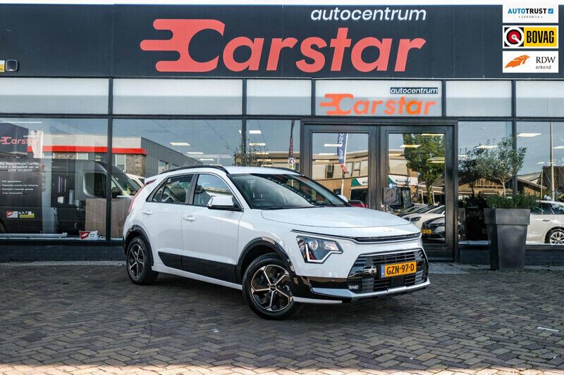 Wit Nieuw 2025 Kia Niro SUV | € 33.950 (Eerlijke prijs) - Afbeelding 1/4