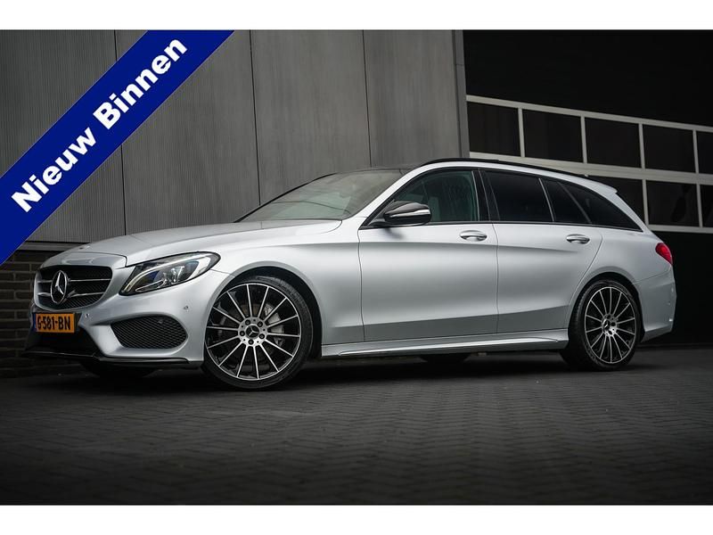 Grijs (metallic) Occasion 2015 Mercedes C180 AMG Stationwagen | € 17.945 (Eerlijke prijs) - Afbeelding 1/4