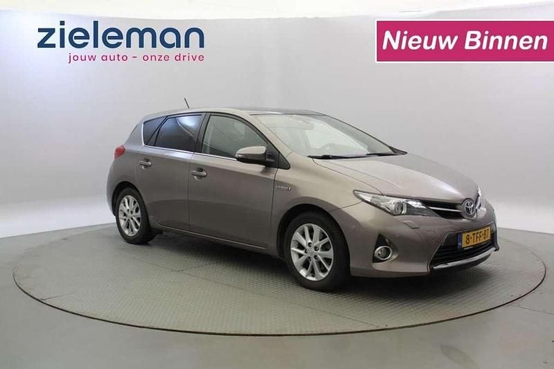 Bruin Gebruikt 2014 Toyota Auris Hybrid Hatchback | € 8.845 (Eerlijke prijs) - Afbeelding 1/4