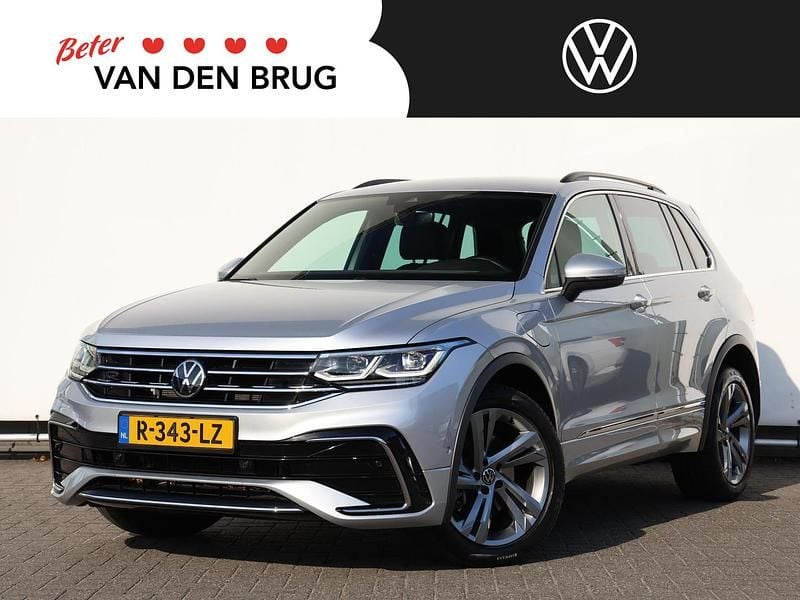 Grijs Gebruikt 2022 VW Tiguan R-line SUV | € 37.695 (Eerlijke prijs) - Afbeelding 1/4