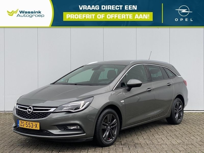 Grijs Gebruikt 2019 Opel Astra Edition Stationwagen | € 13.895 (Eerlijke prijs) - Afbeelding 1/4