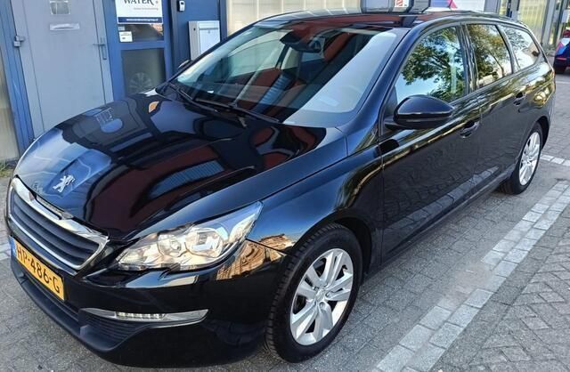 Zwart Gebruikt 2015 Peugeot 308 Stationwagen | € 4.495 (Goede deal) - Afbeelding 1/4