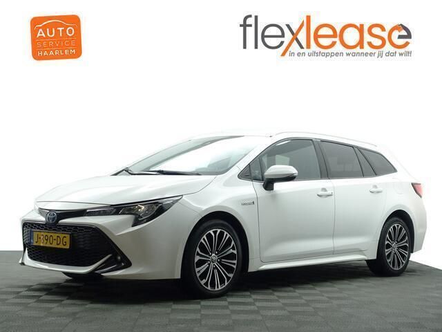 Wit metallic Gebruikt 2020 Toyota Corolla Business Edition Stationwagen | € 16.900 (Eerlijke prijs) - Afbeelding 1/4