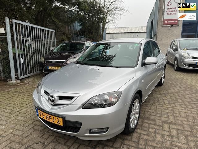 Grijs Gebruikt 2009 Mazda 3 Active Hatchback | € 4.444 (Eerlijke prijs) - Afbeelding 1/4