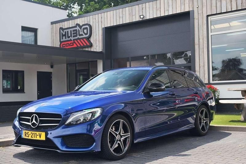 Blauw, metallic lak Gebruikt 2018 Mercedes C180 AMG line Stationwagen | € 19.750 (Eerlijke prijs) - Afbeelding 1/4