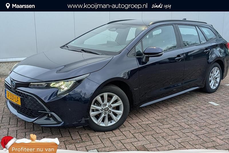 Blauw Gebruikt 2023 Toyota Corolla Hybrid Active Stationwagen | € 24.749 - Afbeelding 1/4
