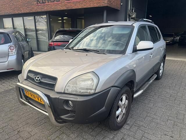 Grijs Gebruikt 2005 Hyundai Tucson Dynamiq SUV | € 3.295 (Eerlijke prijs) - Afbeelding 1/4