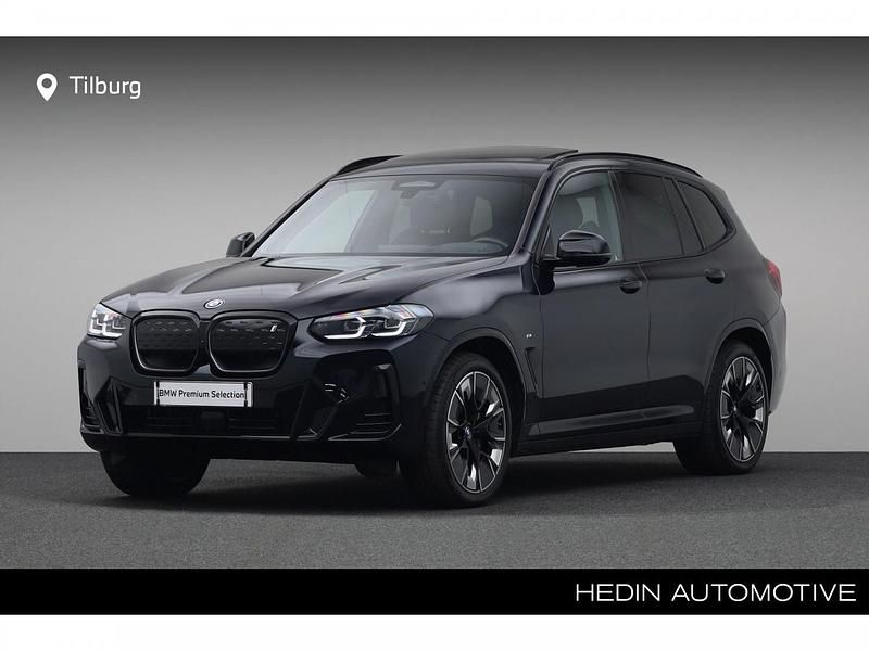 M carbonschwarz metallic (zwart metallic) Gebruikt 2023 BMW iX3 Comfort Edition SUV | € 48.880 (Eerlijke prijs) - Afbeelding 1/4