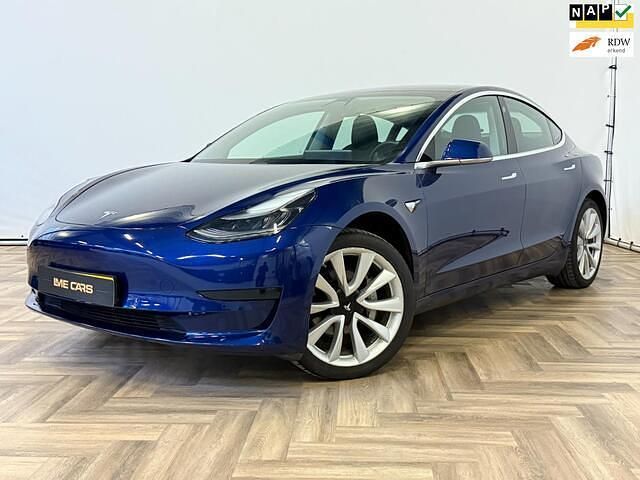 Blauw, metallic lak Gebruikt 2019 Tesla Model 3 Standard Range Sedan | € 15.944 (Eerlijke prijs) - Afbeelding 1/4