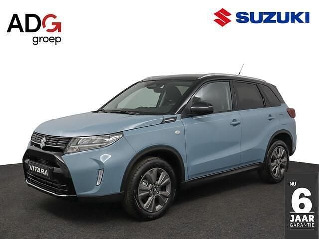 Blauw Nieuw 2025 Suzuki Vitara SUV | € 31.348 (Eerlijke prijs) - Afbeelding 1/4