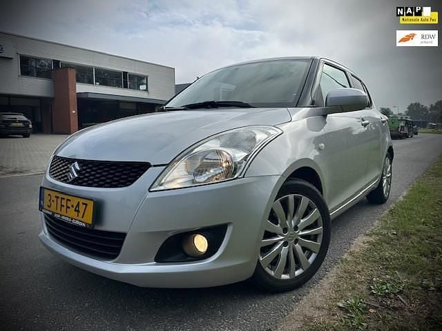 Grijs Gebruikt 2014 Suzuki Swift Exclusive Hatchback | € 5.450 (Eerlijke prijs) - Afbeelding 1/4