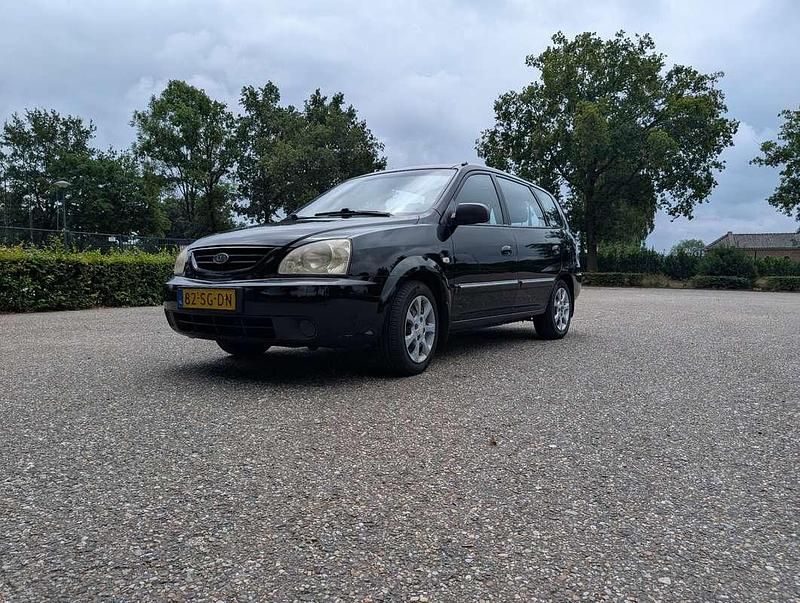 Zwart Gebruikt 2006 Kia Carens LX MPV | € 1.800 - Afbeelding 1/4