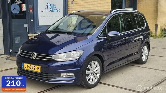 Blauw Gebruikt 2016 VW Touran Highline MPV | € 12.750 (Eerlijke prijs) - Afbeelding 1/4