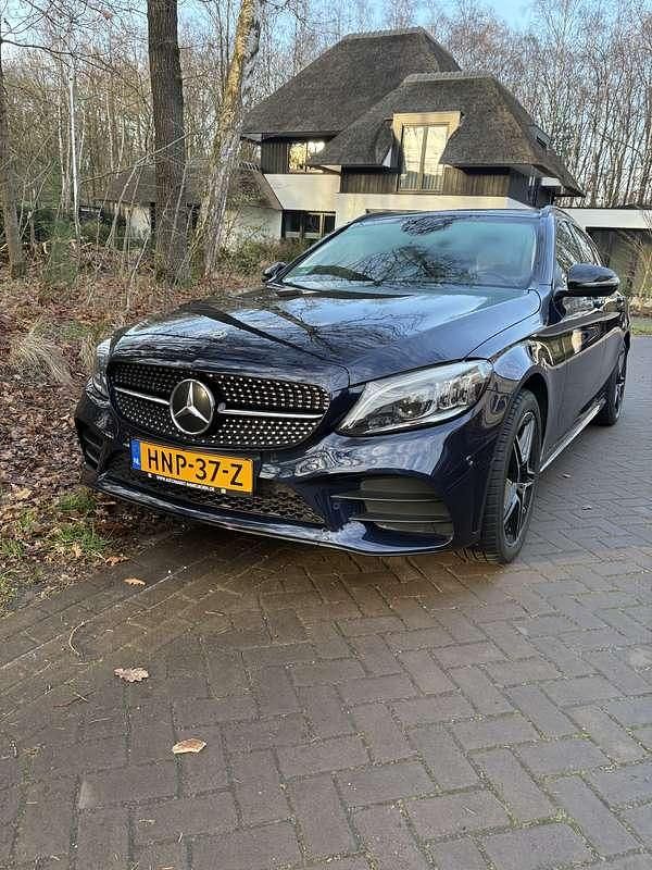Blauw Gebruikt 2021 Mercedes C300e AMG Stationwagen | € 25.950 (Eerlijke prijs) - Afbeelding 1/4