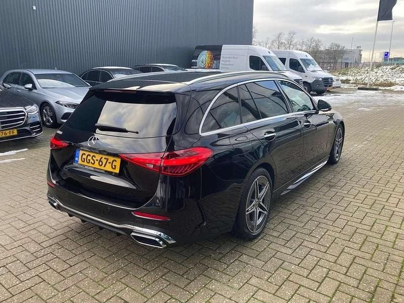 Occasion Mercedes C180 AMG line 170 PK (125 kW) 2024 Zwart Stationwagen