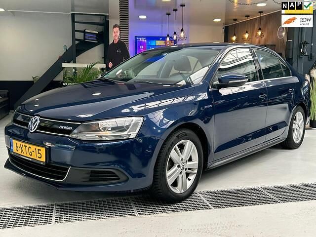 Blauw Gebruikt 2013 VW Jetta Highline Sedan | € 6.995 (Eerlijke prijs) - Afbeelding 1/4