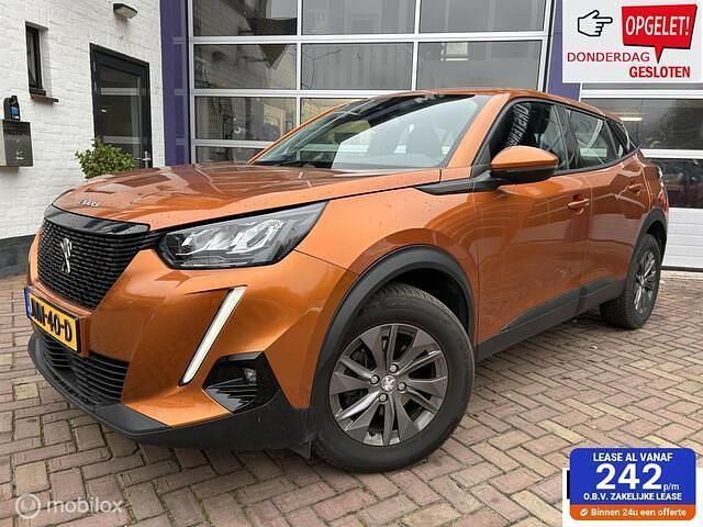 Oranje Gebruikt 2021 Peugeot 2008 Active SUV | € 14.944 (Goede deal) - Afbeelding 1/4
