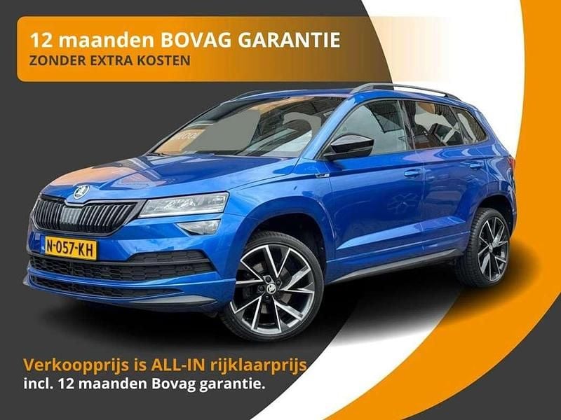 Blauw Gebruikt 2021 Skoda Karoq SportLine SUV | € 32.850 (Goede deal) - Afbeelding 1/3