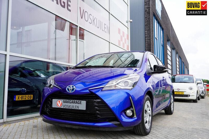 Blauw, metallic lak Gebruikt 2019 Toyota Yaris Hybrid Hatchback | € 17.139 (Super prijs) - Afbeelding 1/4