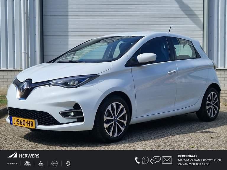 Blanc glacier 369 Gebruikt 2020 Renault Zoe Zen Hatchback | € 13.435 (Eerlijke prijs) - Afbeelding 1/4