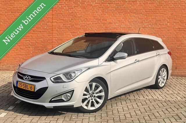 Grijs Gebruikt 2011 Hyundai i40 Stationwagen | € 9.475 (Eerlijke prijs) - Afbeelding 1/4