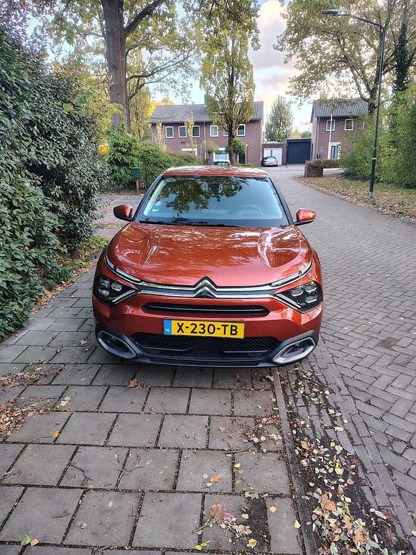 Oranje (metallic) Gebruikt 2021 Citroën C4 Business Class SUV | € 14.995 (Super prijs) - Afbeelding 1/4