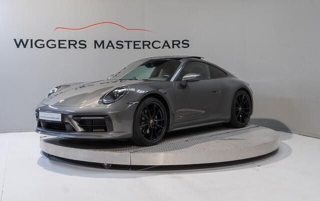 Grijs (metallic) Gebruikt 2021 Porsche 911 Carrera Sport Coupé | € 132.850 (Duur) - Afbeelding 1/4