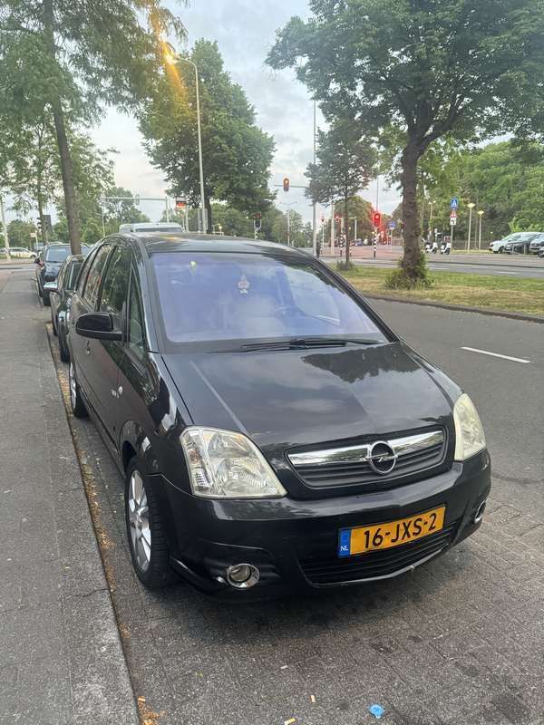 Zwart Gebruikt 2009 Opel Meriva Cosmo MPV | € 2.650 (Iets duurder) - Afbeelding 1/4