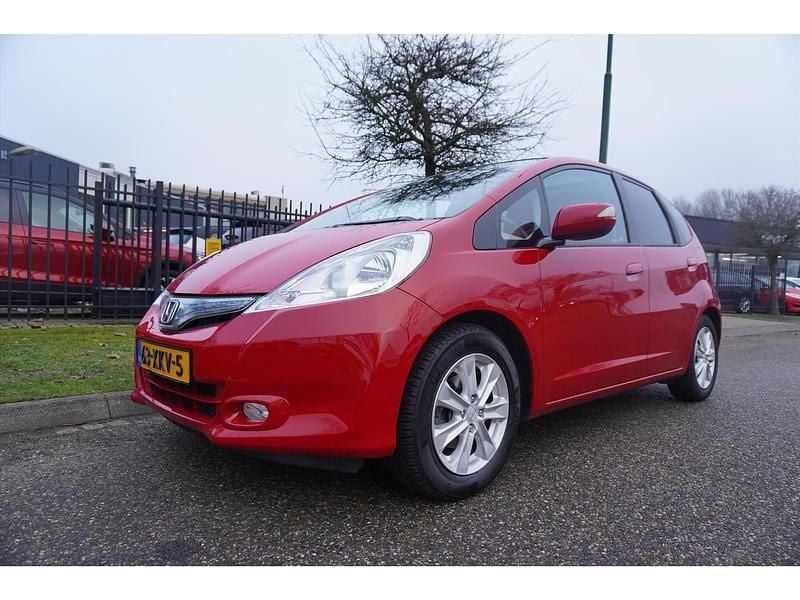 Rood Occasion 2012 Honda Jazz Exclusive Hatchback | € 5.945 (Goede deal) - Afbeelding 1/4