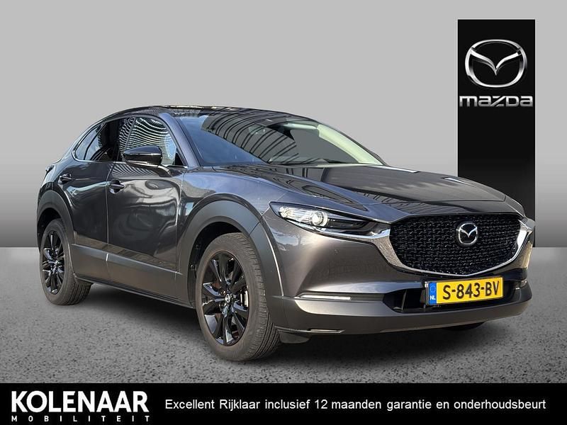 Machine gray Gebruikt 2023 Mazda CX-30 Homura-Line SUV | € 30.595 (Eerlijke prijs) - Afbeelding 1/4