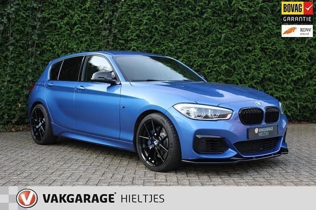Blauw (metallic) Gebruikt 2017 BMW M140 M Sport Hatchback | € 34.950 (Eerlijke prijs) - Afbeelding 1/3