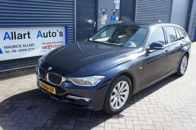 Blauw Gebruikt 2014 BMW 320 Luxury Line Stationwagen | € 17.950 (Duur) - Afbeelding 1/4