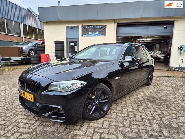 Zwart Gebruikt 2013 BMW 520 Executive Stationwagen | € 7.950 (Super prijs) - Afbeelding 1/4