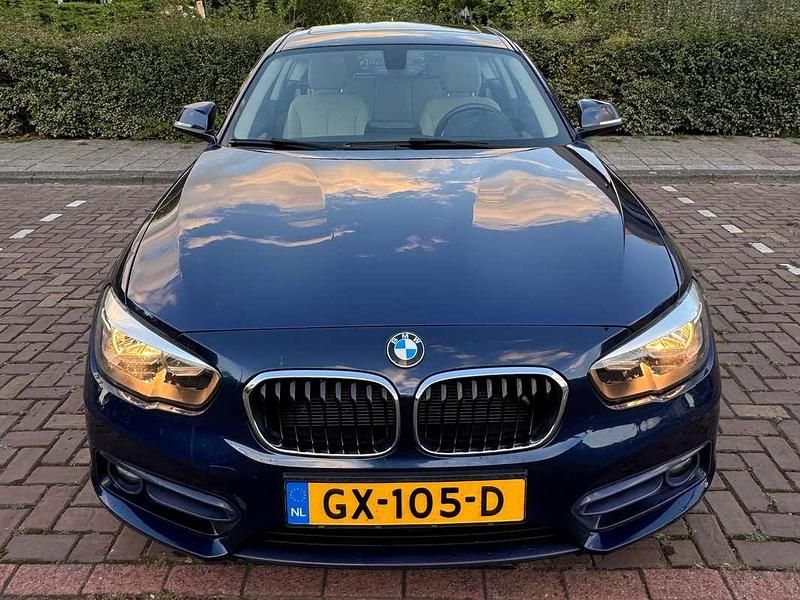 Blauw Gebruikt 2015 BMW 116 Sport Line Hatchback | € 7.500 - Afbeelding 1/4