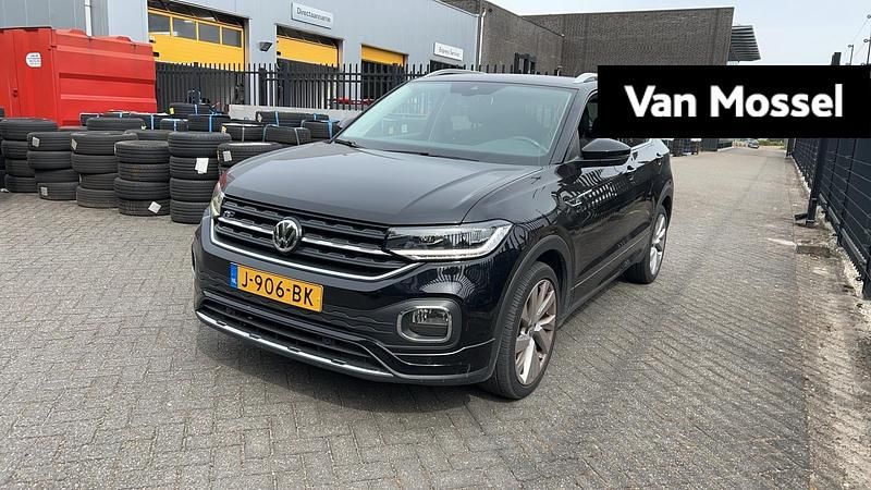 Zwart Gebruikt 2020 VW T-Cross Beats SUV | € 23.900 (Eerlijke prijs) - Afbeelding 1/4