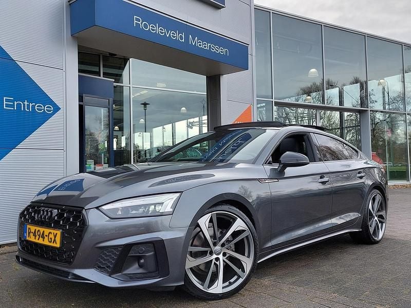 Grijs Gebruikt 2022 Audi A5 Sportback Premium Hatchback | € 32.945 - Afbeelding 1/3