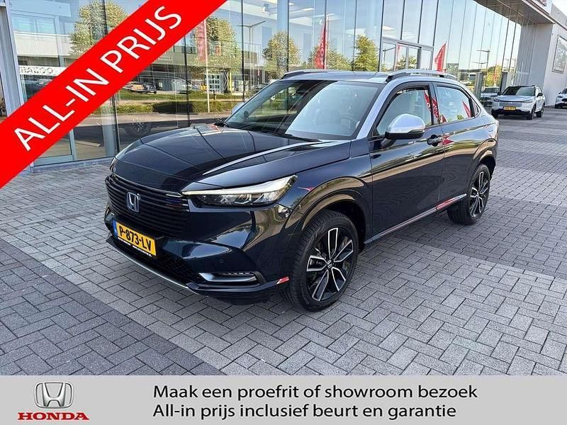 Blauw, metallic lak Gebruikt 2022 Honda HR-V Advance SUV | € 30.990 (Eerlijke prijs) - Afbeelding 1/4