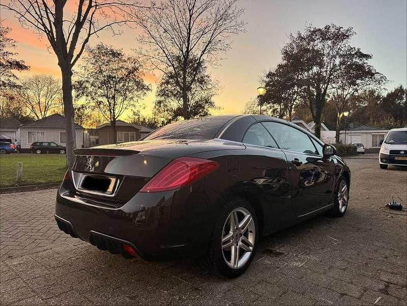 Bruin Gebruikt 2009 Peugeot 308 CC Cabriolet | € 3.500 (Eerlijke prijs) - Afbeelding 1/4