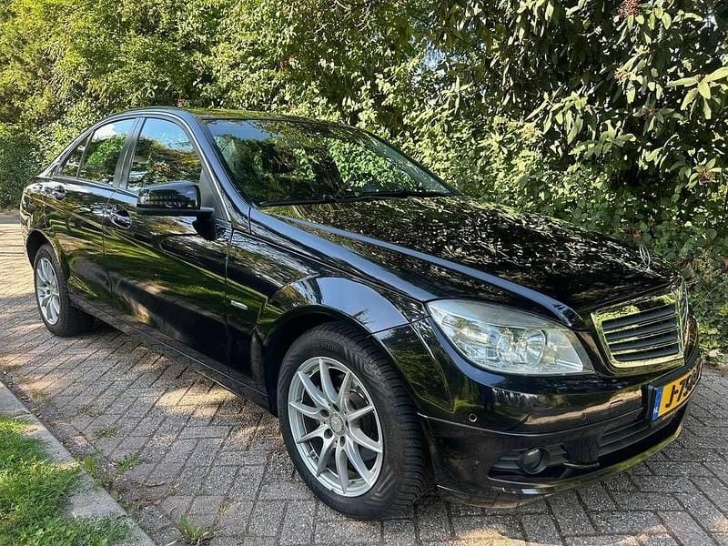 Zwart Gebruikt 2010 Mercedes C180 Sedan | € 6.950 (Goede deal) - Afbeelding 1/4