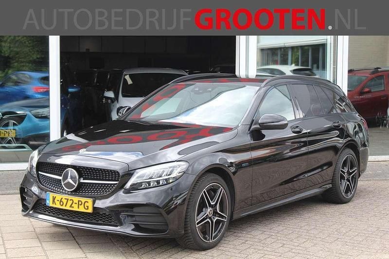 Zwart Gebruikt 2021 Mercedes C300e Business Stationwagen | € 24.988 (Super prijs) - Afbeelding 1/4
