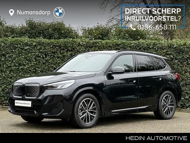 Zwart (metallic) Gebruikt 2025 BMW iX1 M Sport SUV | € 52.895 (Super prijs) - Afbeelding 1/3
