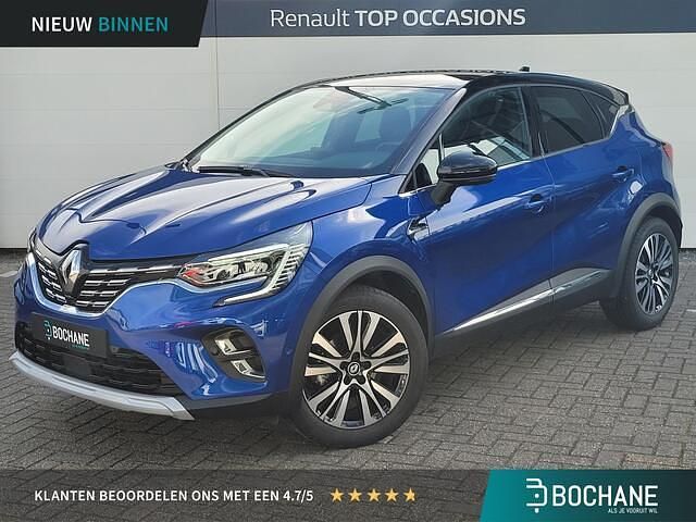 Twotone bleu iron (rqh) & noir étoilé (gne) Gebruikt 2024 Renault Captur Iconic SUV | € 31.200 (Iets duurder) - Afbeelding 1/4