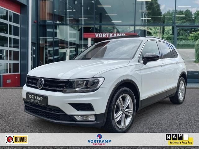Wit, andere lak Gebruikt 2016 VW Tiguan Highline SUV | € 22.500 (Eerlijke prijs) - Afbeelding 1/4